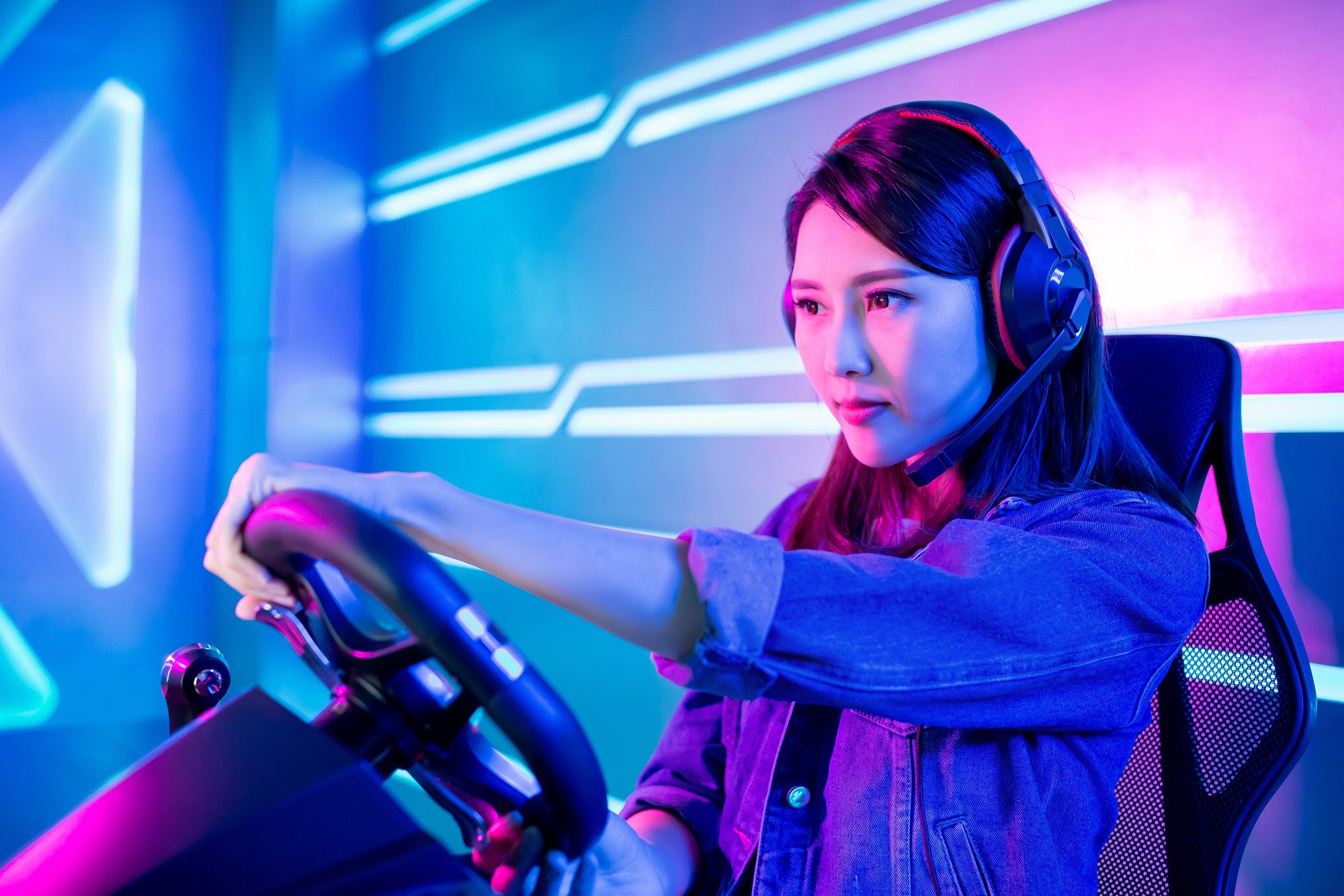 Young Asian Pro Gamer Girl Play Car Racing Online Video Game
